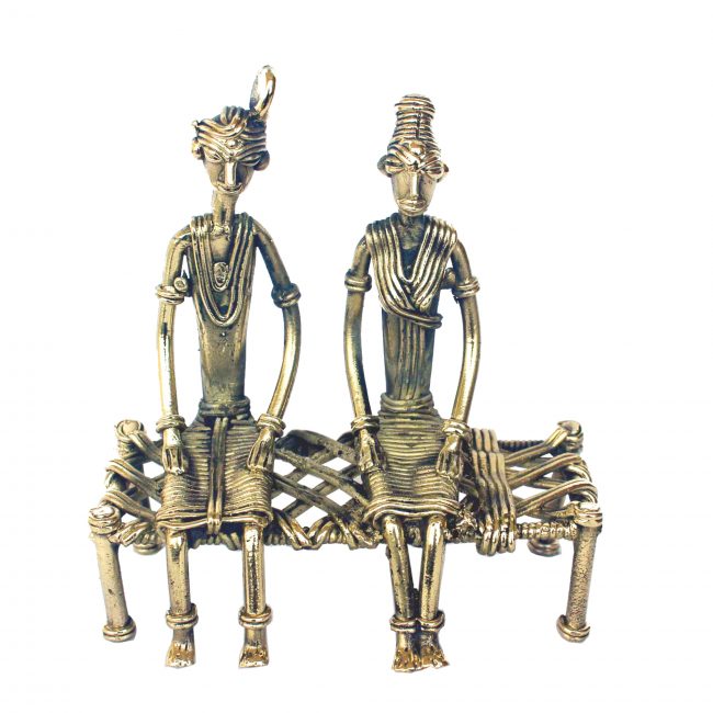 Handcrafted Metal Couple On Bed