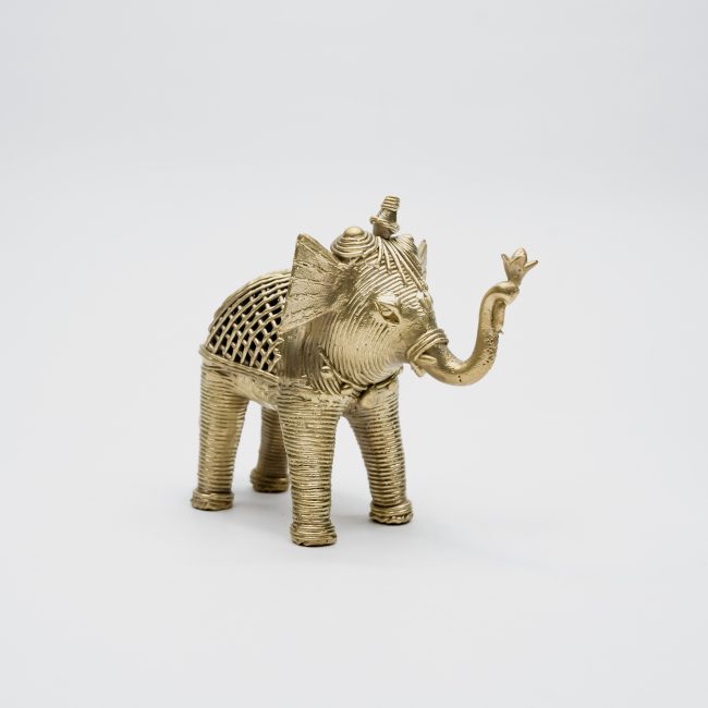 Handcrafted Dhokra Metal Elephant Holding Lotus In Trunk