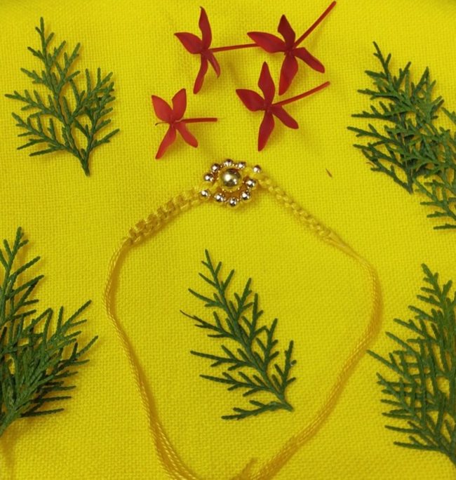 Exclusive Hand Crafted Wheel Bead Design Rakhi Made By Tribals Of Assam