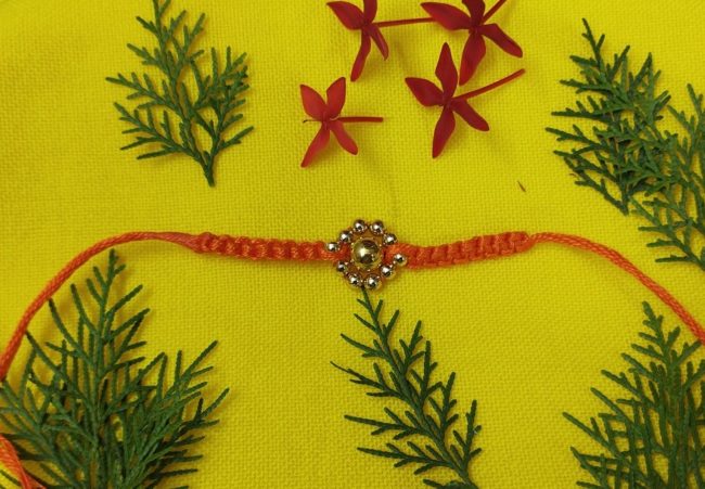 Exclusive Hand Crafted Wheel Bead Design Rakhi Made By Tribals Of Assam