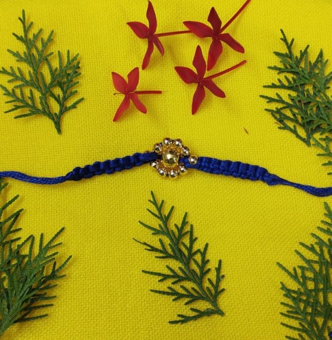 Exclusive Hand Crafted Wheel Bead Design Rakhi Made By Tribals Of Assam